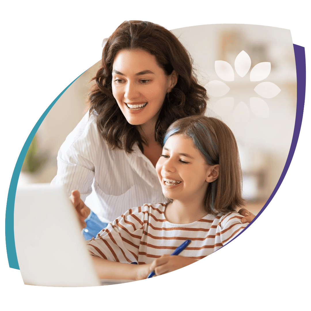 Therapist working with a child at a table.