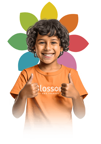 Happy child wearing a Blossom ABA Therapy shirt with flower petals framing